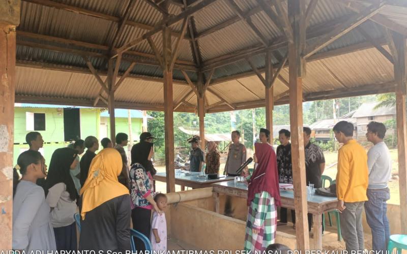 Kapolsek Nasal Hadiri Kegiatan Rapat Penetapan dan Pengundian Nomor Urut Calon Kepala Desa Pasar Jumat