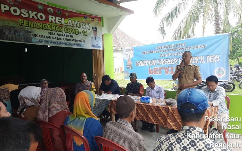 Bhabinkamtibmas Menghadiri MusDes Penyusunan RKPDesa Tahun 2024 di Desa Pasar Baru 