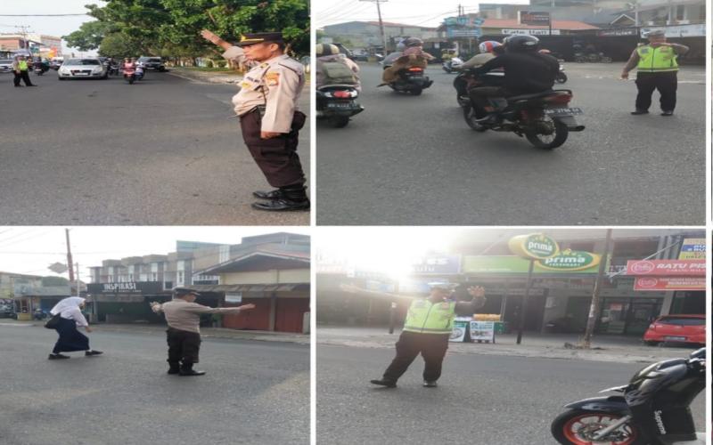 Polsek Gading Cempaka Pengaturan Arus Lalin Pagi Hari di Persimpangan 