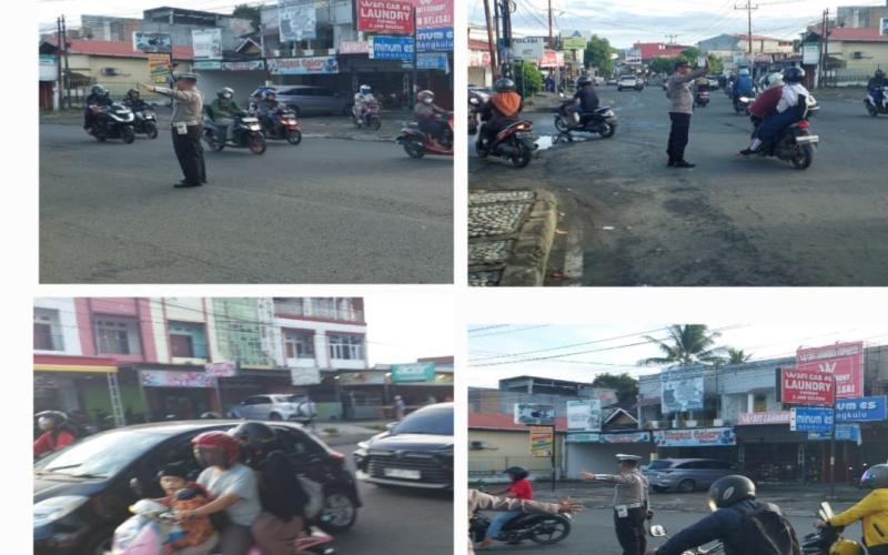 Personel Polsek Gading Cempaka Amankan Arus Pagi di Simpang Jalan KS Tubun