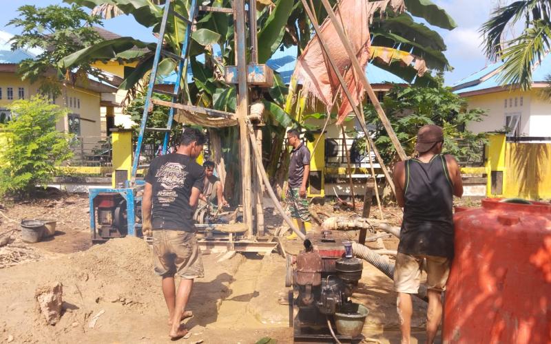 Sumur Bor Kelima Hampir Tuntas Dibangun Satgas TMMD Ke-124 Kodim 0408/BS