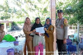 Bhabinkamtibmas Polsek Kaur Utara Monitoring Penyaluran BLT DD Tahap III Desa Gunung Kayo 