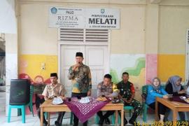 Bhabinkamtibmas Polsek Kaur Selatan  Hadiri Penyaluran BLT DD di Desa Air Dingin