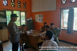 Sambangi Kantor Camat, Bhabinkamtibmas Polsek Muara Sahung Sampaikan Imbaun Kamtibmas