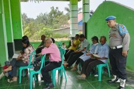 Polsek Penarik Laksanakan Pengamanan Ibadah di Gereja GKSBS Penarik Desa Lubuk Mukti