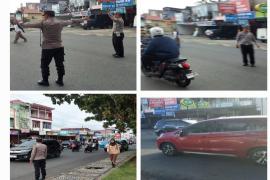 Polsek Gading Cempaka Laksanakan Pengaturan Lalu Lintas Pagi di Simpang Jl. Ks. Tubun