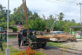 Satgas TMMD Ke-124 Kodim 0408/BS dan Warga Gotong Royong Siapkan Lapangan 